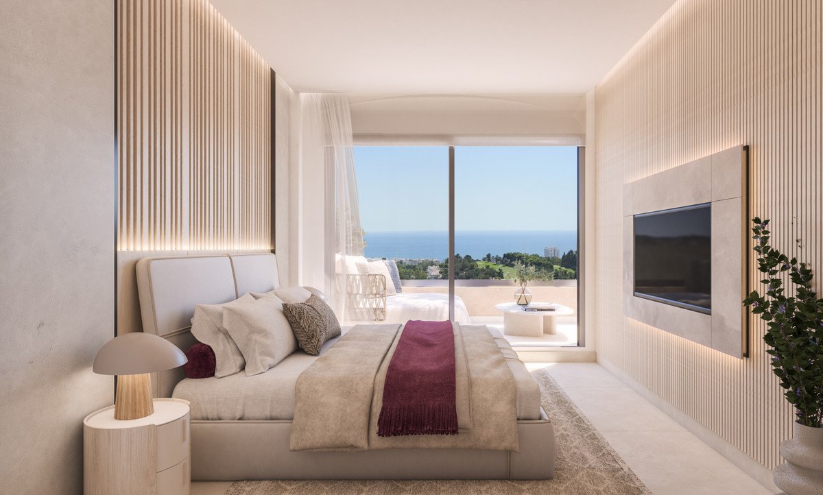 Modern bedroom at Abelias with terrace views over Golf Torrequebrada and the Mediterranean Sea