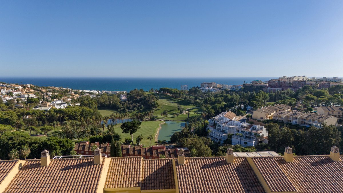 Panoramic view of Golf Torrequebrada and the Mediterranean Sea from Abelias in Benalmádena